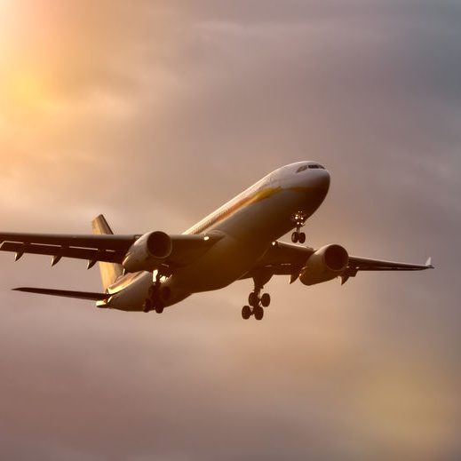 air plane in sunset sky A photography of a jet air plane in sunset sky