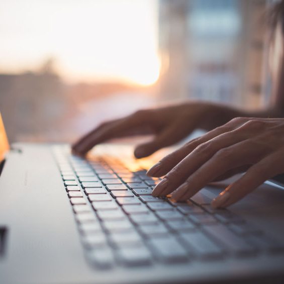 Woman working at home office hand on keyboard close up Woman working at home office hand on keyboard close up.