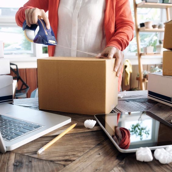 Young startup entrepreneur small business owner working at home, Business Start up SME concept. Young startup entrepreneur small business owner working at home, packaging and delivery situation.